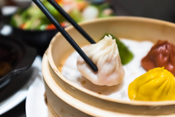 Xiao Long Bao picked up with chopsticks