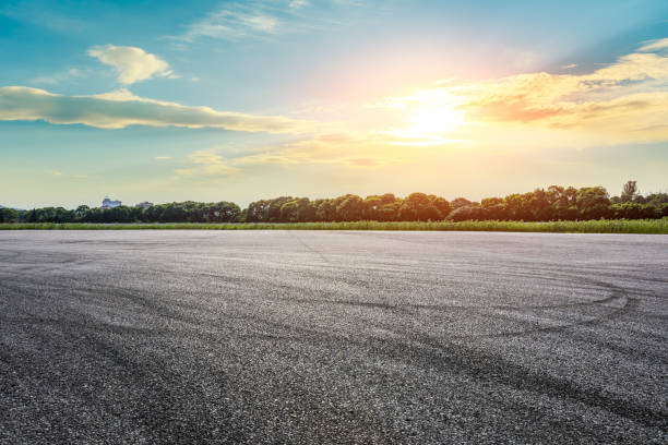 istock Asphalt race track road and green forest 1437823449