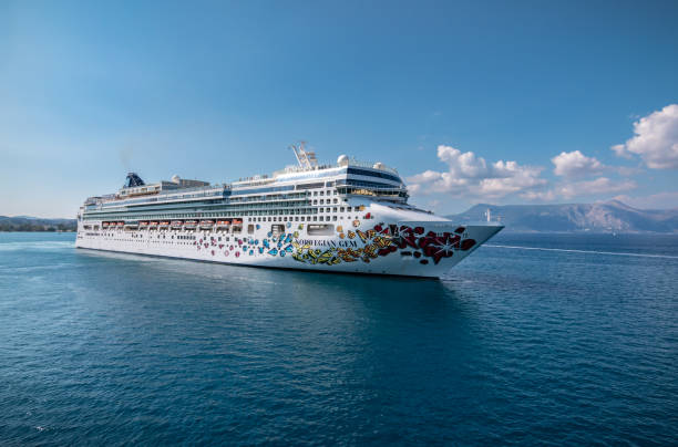 CORFU, GREECE - SEPTEMBER 6, 2022: Cruise Ship Norwegian Gem, Norwegian Cruise Line, sailing away from cruise port in Corfu, Greece. Side view.