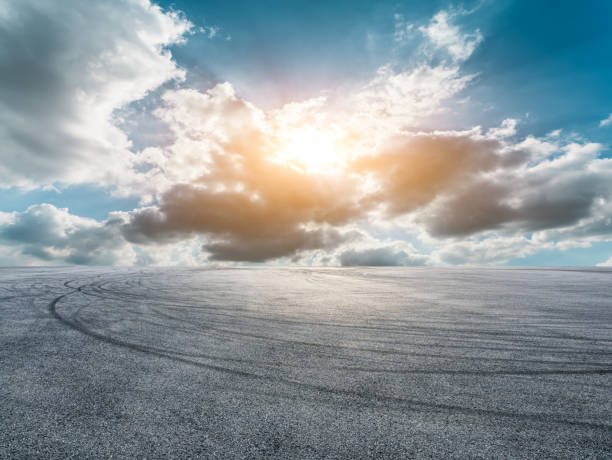 istock Asphalt race track road at sunset 1437823983
