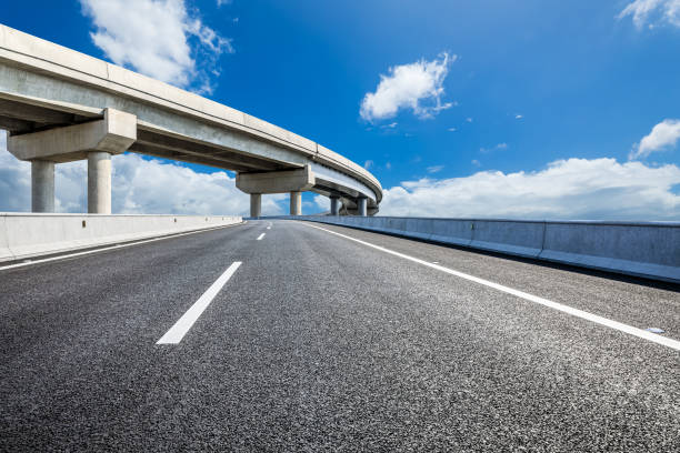 istock Asphalt road and bridge background 1437823999
