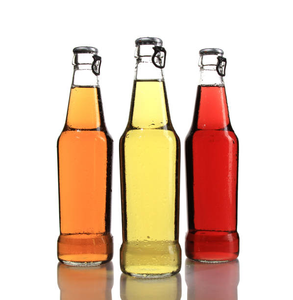 istock Set of three different beer bottles isolated on a white background 1437826248