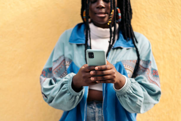 istock African Woman Using Phone 1437827444