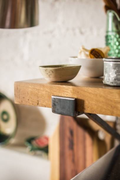 istock Close-up shot of various kitchenware objects in japandi style standing on the wooden table 1437832386