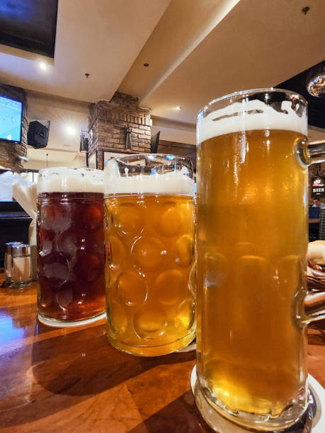 istock beer in the glass at table. 1437833645