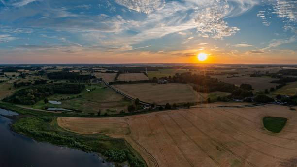 istock Panoramic shot of the sunset over fields, Denmark 1437835093