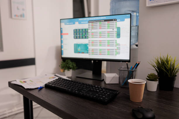 istock Workplaces with computer without people in coworking office 1437837291