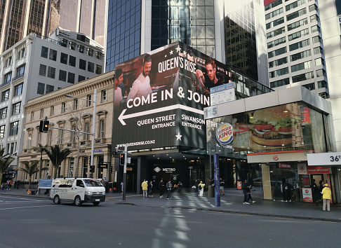 Auckland, New Zealand – August 25, 2019: View of New World Metro supermarket and Burger King restaurant on Queen Street