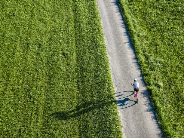 istock droneview of a cyclist 1437839841