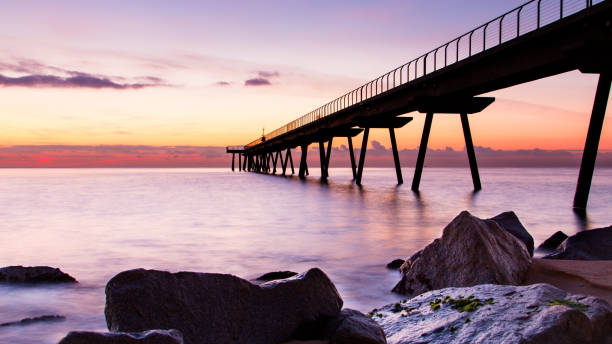 istock Sunrise on the endless road in the sea 1437840196