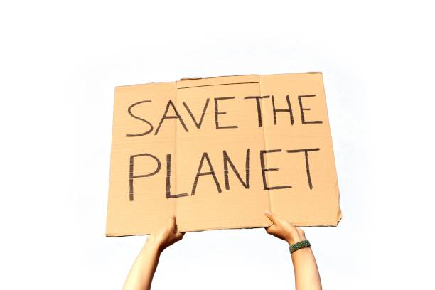 istock A Cardboard Signs saying Save the Planet held by two hands on a white background 1437840458