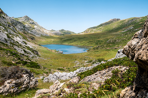 A beautiful lake surrounded by mountains in Somiedo National Park, Asturias.