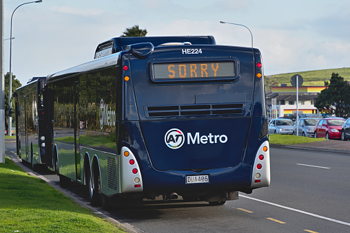 Auckland, New Zealand – August 21, 2019: Auckland / New Zealand - August 21 2019:  Back of Auckland Transport Metro bus with Sorry sign