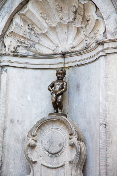 istock Famous Manneken Pis statue located in Brussels, Belgium 1437841866