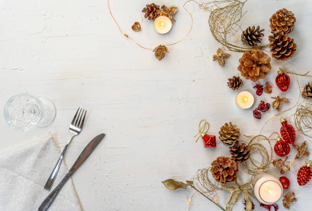 istock Overhead shot of a rustic colorful Christmas dining table with decors and space for text 1437842058