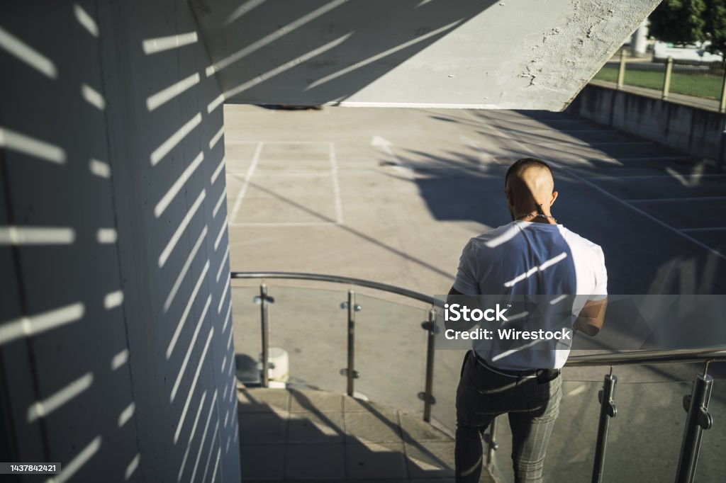 His Falling Back View Of A Man With Shadows Falling On His Back Stock Photo ...