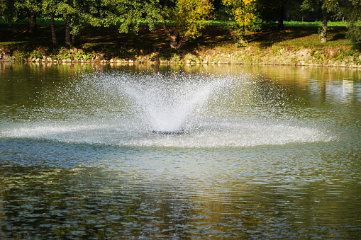 A fountain aerator in a pond