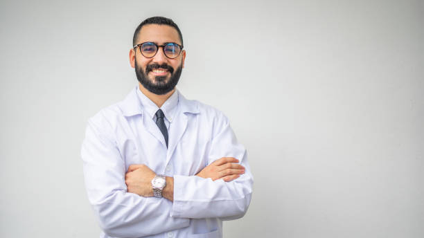 istock Caucasian bearded doctor happily smiling 1437843640