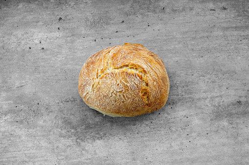 Freshly Baked Bread on a concrete backgrount from above
