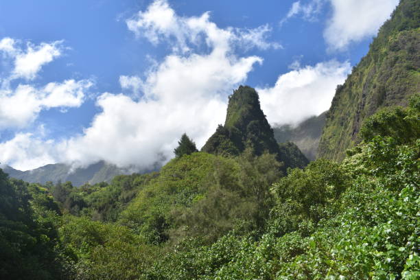 istock Mountain view with clouds on the island of Maui, Hawaii 1437845607
