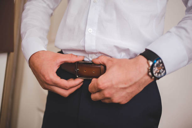 istock Closeup of a groom getting ready for the wedding ceremony 1437846294
