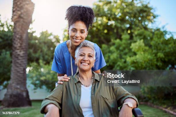 Senior Woman Wheelchair And Medical Nurse In Nursing Home Or Brazil House Garden In Trust Life Insurance Security Or Support Portrait Smile And Happy Retirement Volunteer In Disability Healthcare Stock Photo - Download Image Now