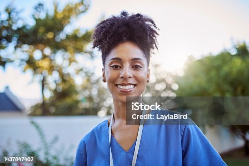 istock Nurse, medical doctor and woman in a garden consulting, working and giving healthcare with a smile. Portrait of a young, happy and helping nursing worker in a nature park for work in medicine 1437847402
