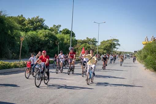 Manavgat,Antalya:Turkey October 29,2022 A bicycle group celebrates 29 October Republic Day Turkey with Turkish flags in Manavgat,Antalya
