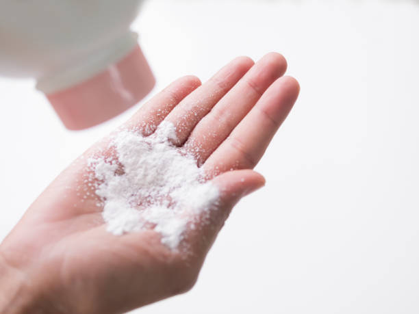 istock Talcum to Hand on white background 1437848587