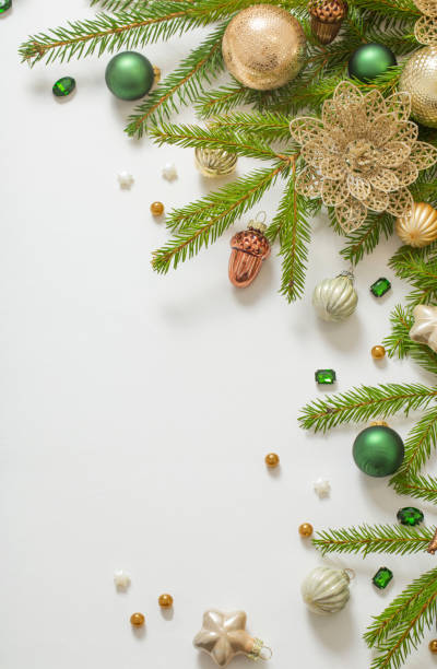 istock golden and green  christmas decorations  on white  background 1437853172