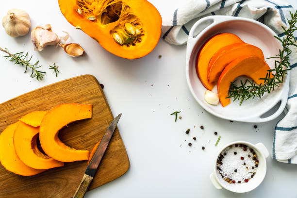 istock A sliced hokkaido pumpkin on a plate and ingredients 1437853295