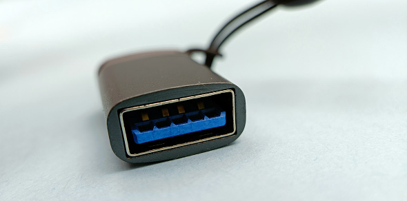 A closeup of HDMI cable port of a laptop