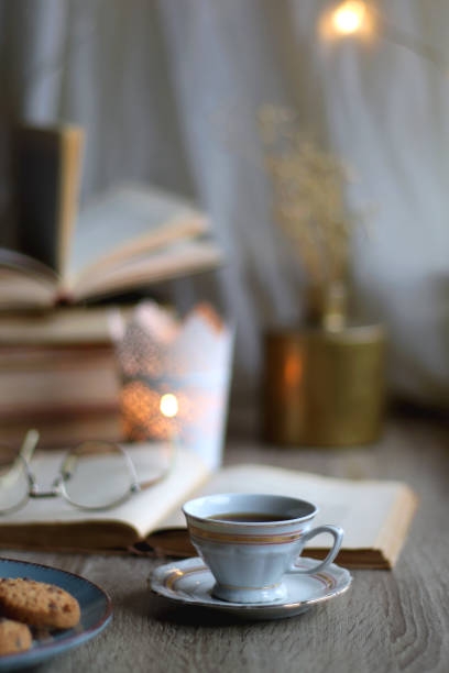 istock Cookies, Tea, Books and Candle 1437856562
