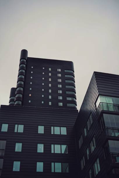 istock Low angle view of modern buildings against sky 1437856794