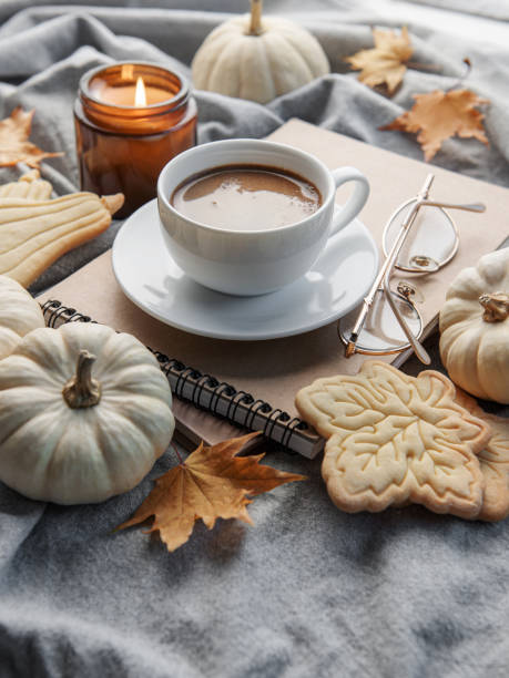 istock White pumpkins, coffee and autumn leaves 1437856996