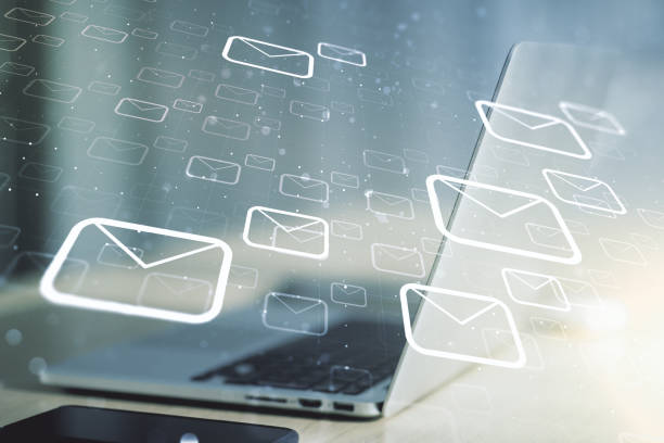 istock Creative abstract postal envelopes sketch on modern laptop background, e-mail and marketing concept. Double exposure 1437857908