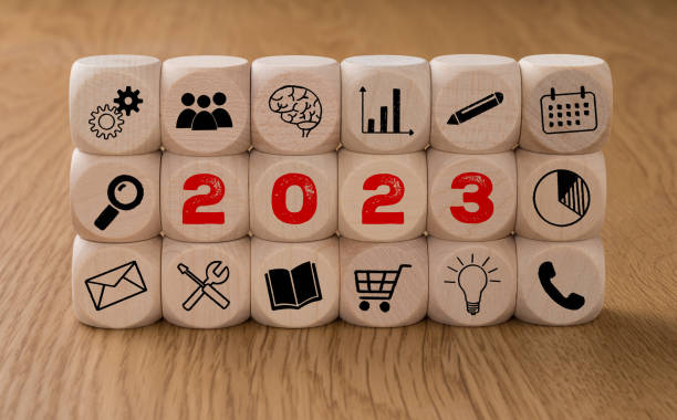istock Dice with icons and the Year 2023 1437864301
