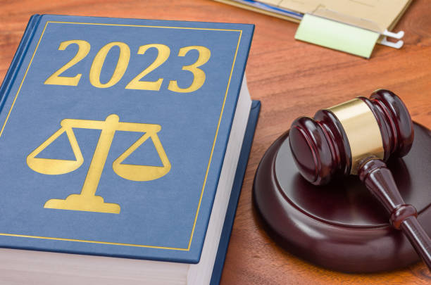 Law book with a gavel - 2023 stock photo