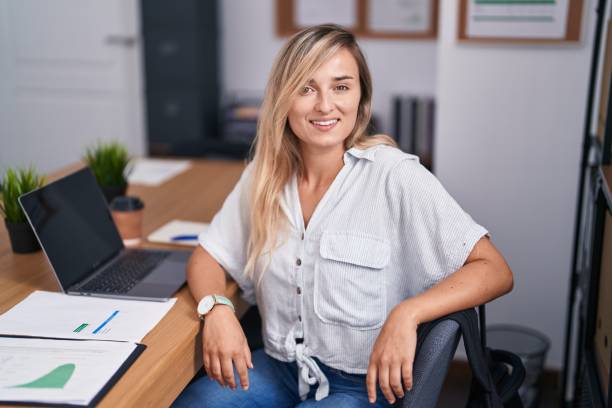 istock Young blonde woman business worker using laptop working at office 1437866138