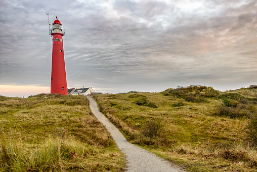 Lighthouse in the dunes at the island of Schiermonnikoog in the Waddensea region in the North of the Netherlands.