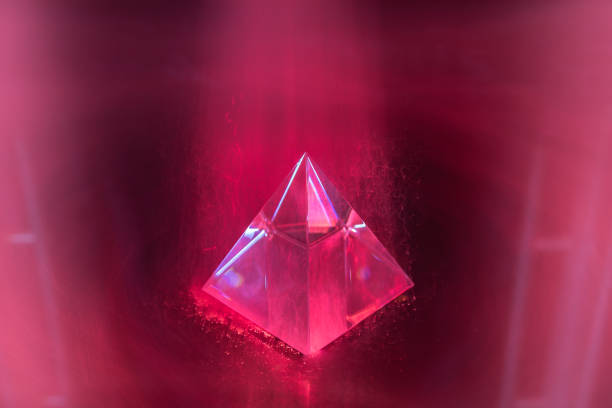 istock Light drawing of a crystal pyramid as a background 1437869214