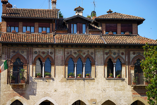 Treviso, Italy - July 6, 2022: Exterior of historic buildings in Treviso, Veneto, Italy
