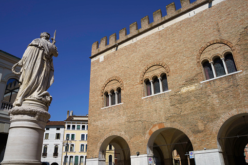 Treviso, Italy - July 6, 2022: Exterior of historic buildings in Treviso, Veneto, Italy. The Palazzo del Trecento
