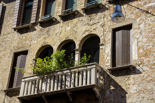 VERONA, ITALY - FEBRUARY 10, 2018: Juliet's house and balcony from William Shakespeare drama Romeo and Juliet