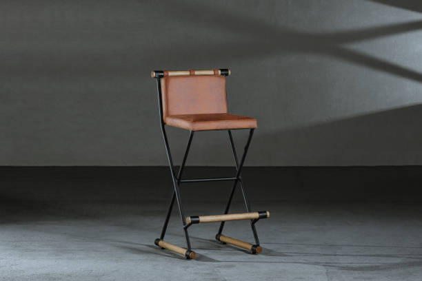 istock Closeup of a brown armless foldable chair 1437871672