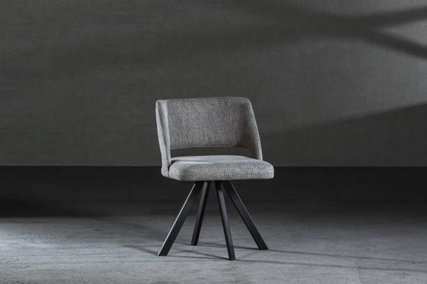 istock Modern gray chair with a concave back and soft upholstery 1437871679