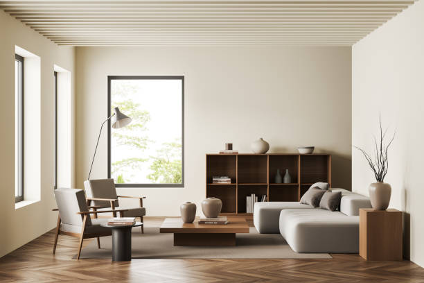 istock Light chill room interior with couch, chairs and shelf, panoramic window 1437873566
