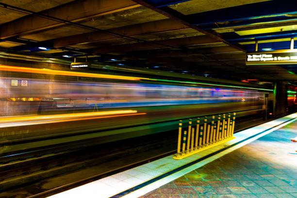 istock Long exposure shot of a glittering modern subway station 1437873983