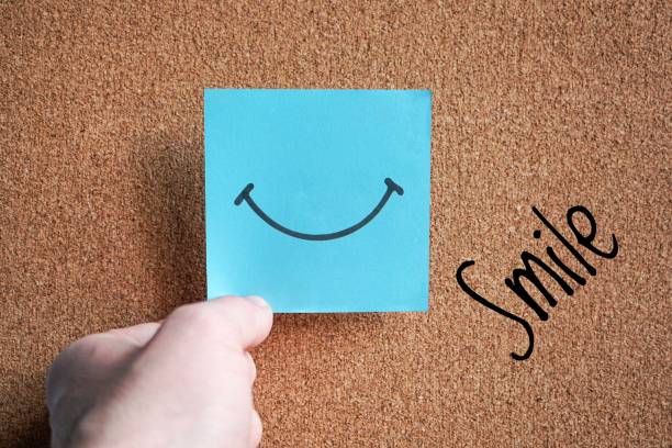 istock smile on the post it, feelings and emotions 1437877421