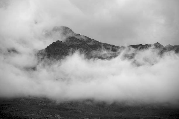 istock Heavy fog over the mountainous landscape 1437877651